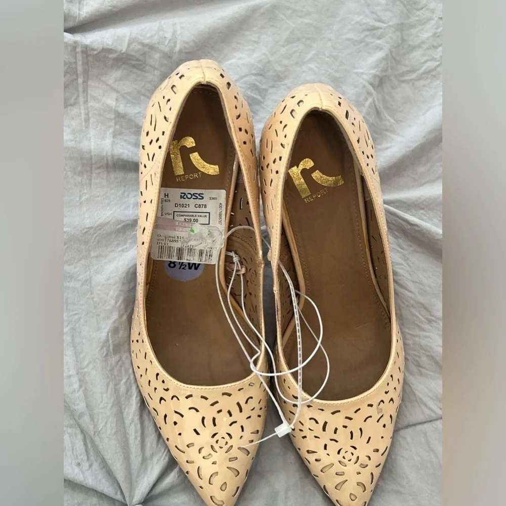 Report Fenestrated pointy toe heels pumps